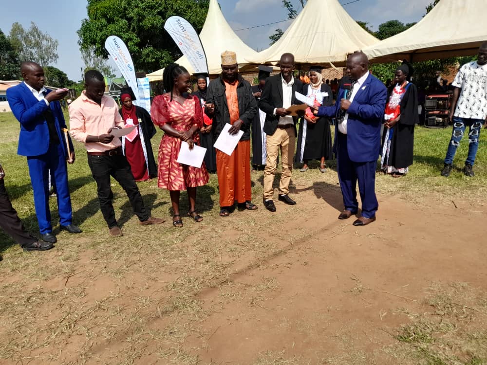 women receiving certificates